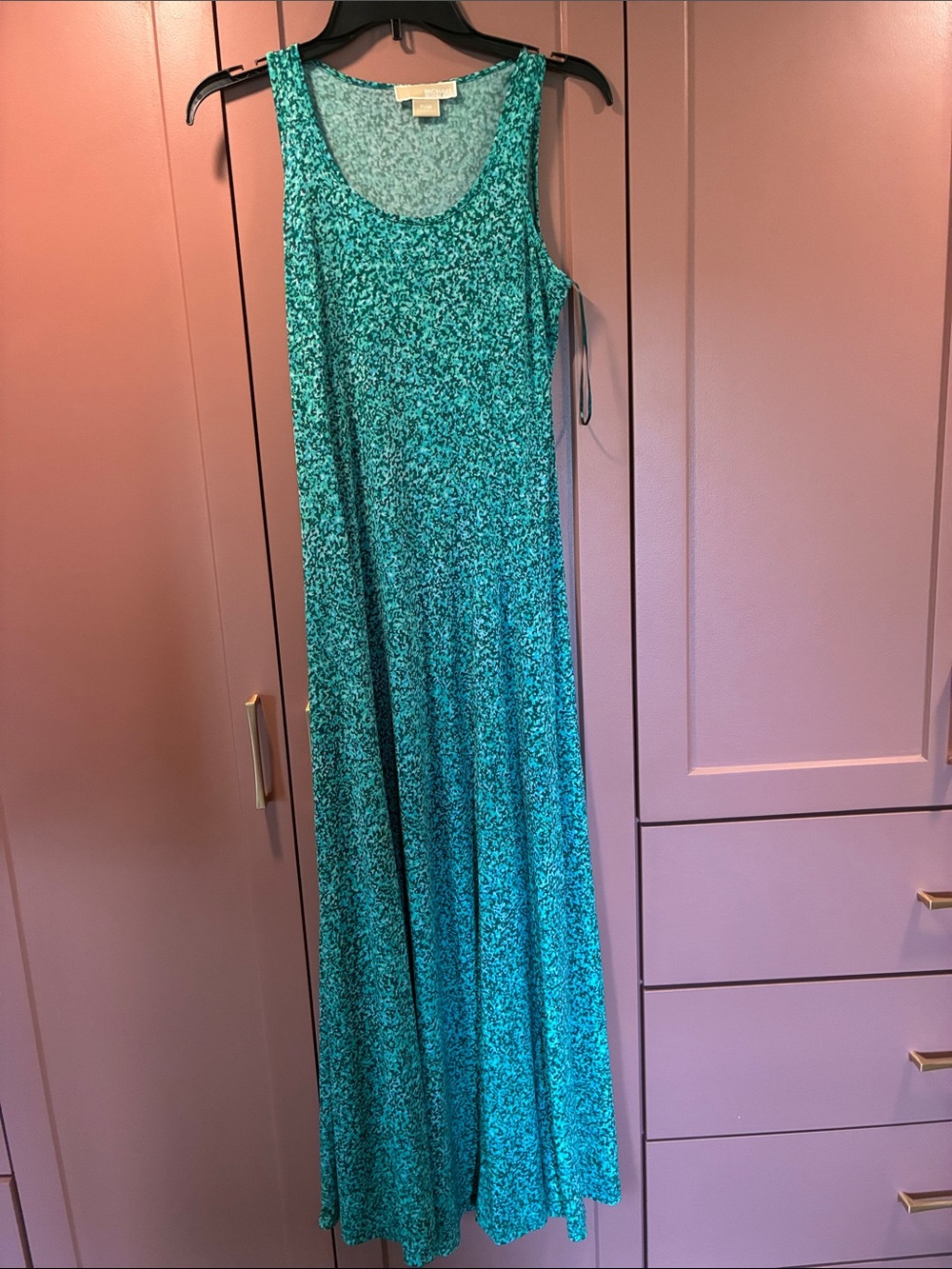 Michael Kors Teal Floral Maxi Dress, with fitting seams and slit.